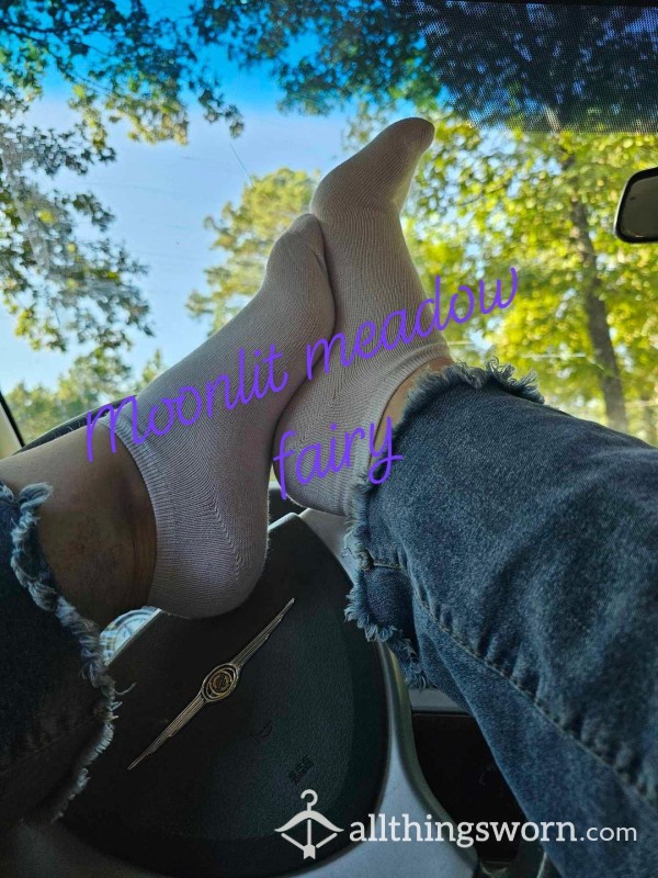 Ankle Sock Feet Pic On Steering Wheel Dash With Lush Green Trees And Blue Sky Background
