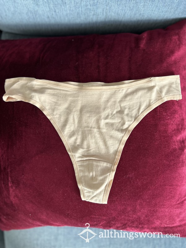Beige Thong 95% Cotton, Crotch Lining 100% Cotton.