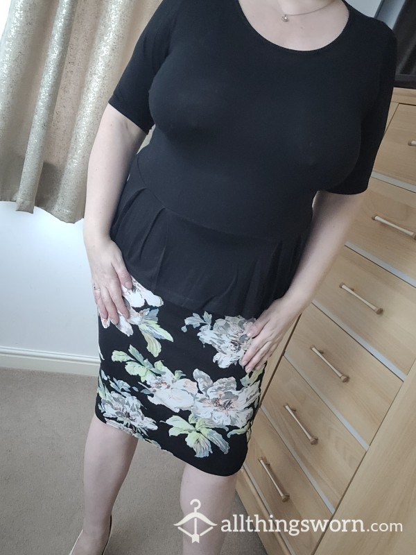Black Top And Flowered Skirt