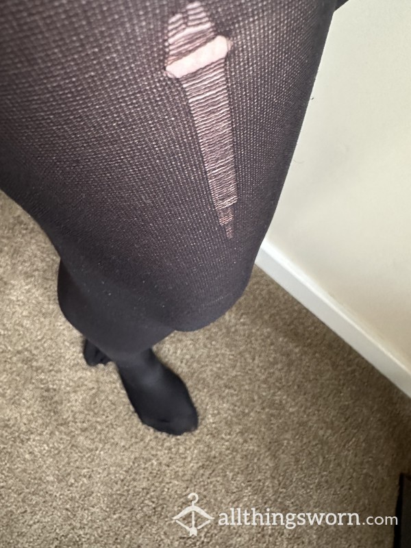 Black Used Tights, With A Rip Up The Leg..