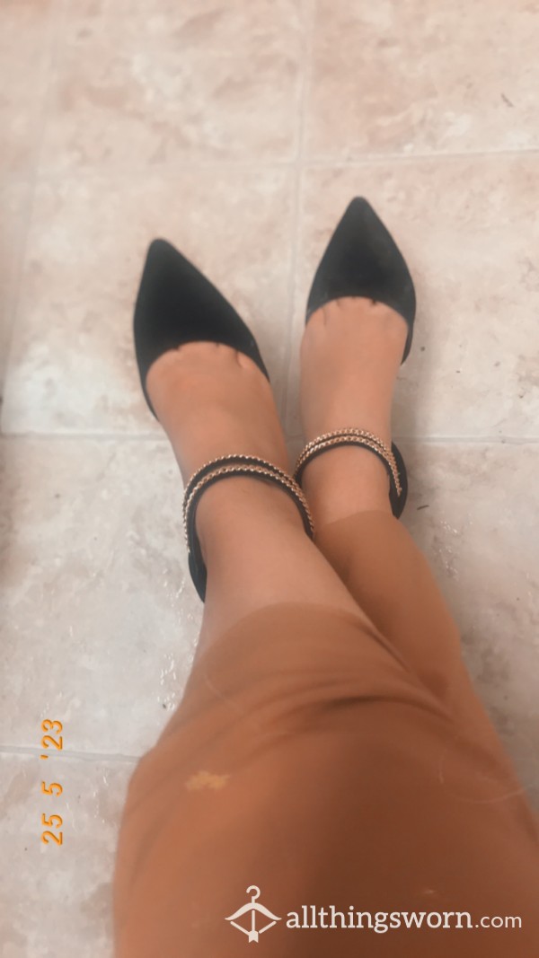 Black worn daily heels photo