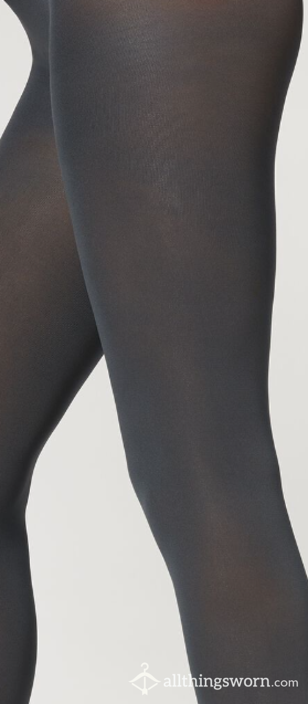 Black Worn Tights With Holes In It