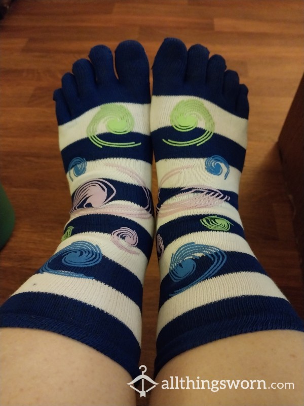 Blue And White High Toe Socks With Designs On It