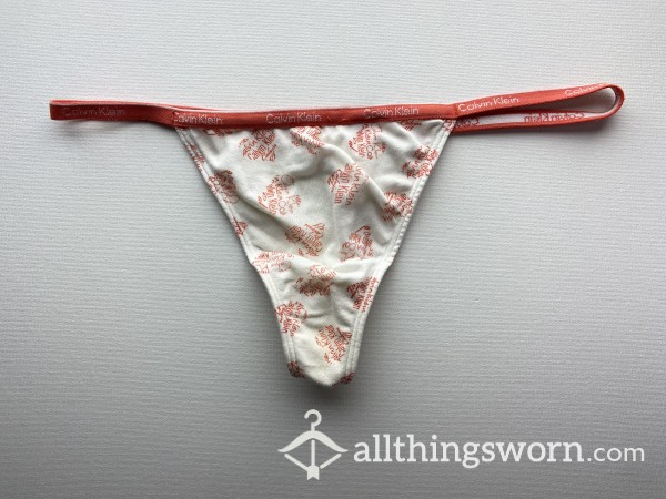 Calvin Klein Thong - Aged & Extremely Well Worn / White With Orange Pattern