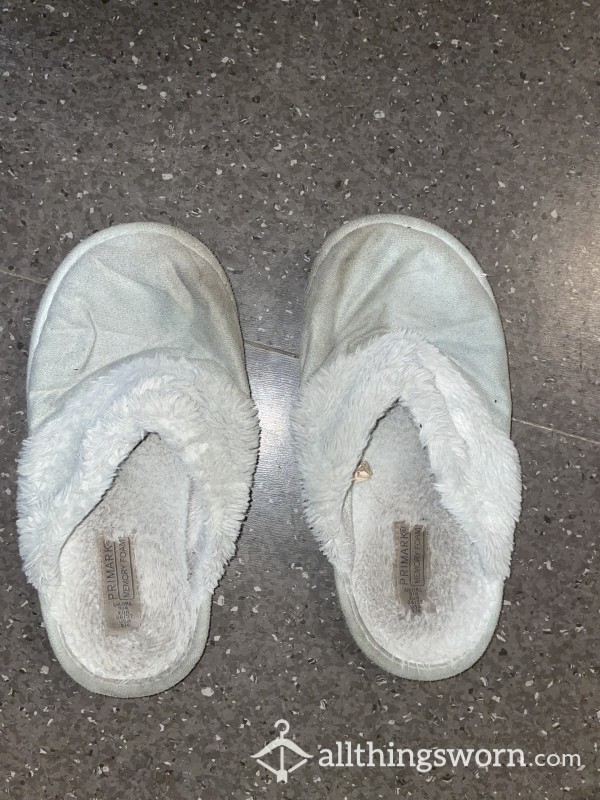 Stinky Well Worn House Slippers