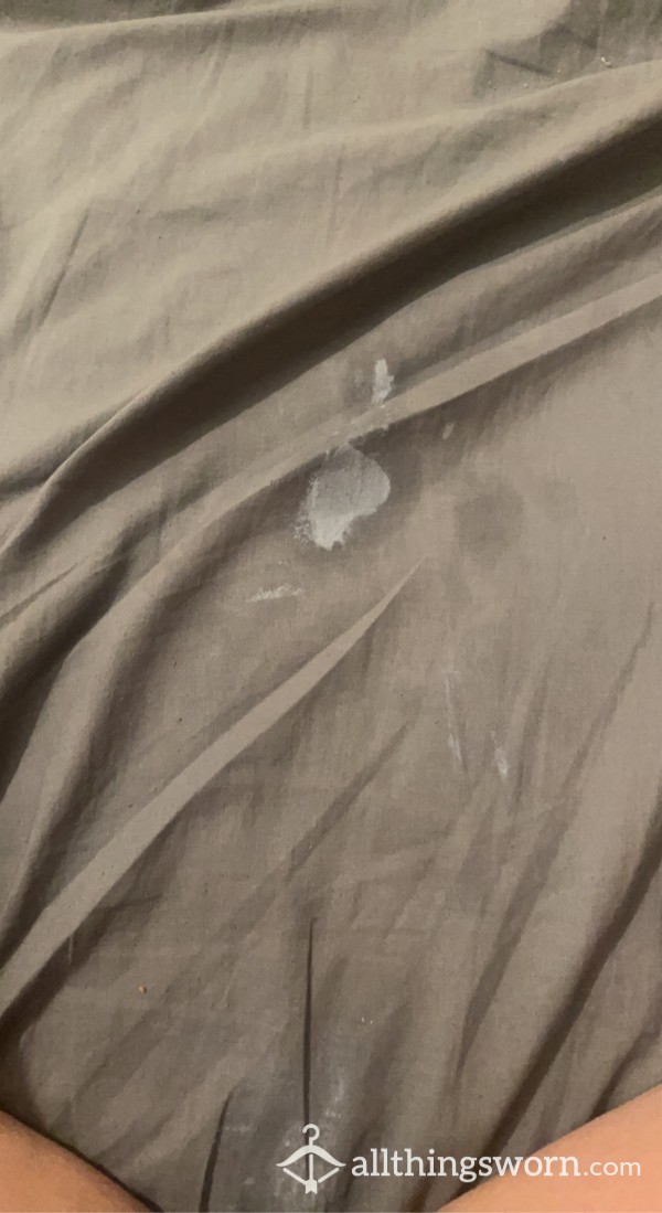 CUM STAINED BED SHEET