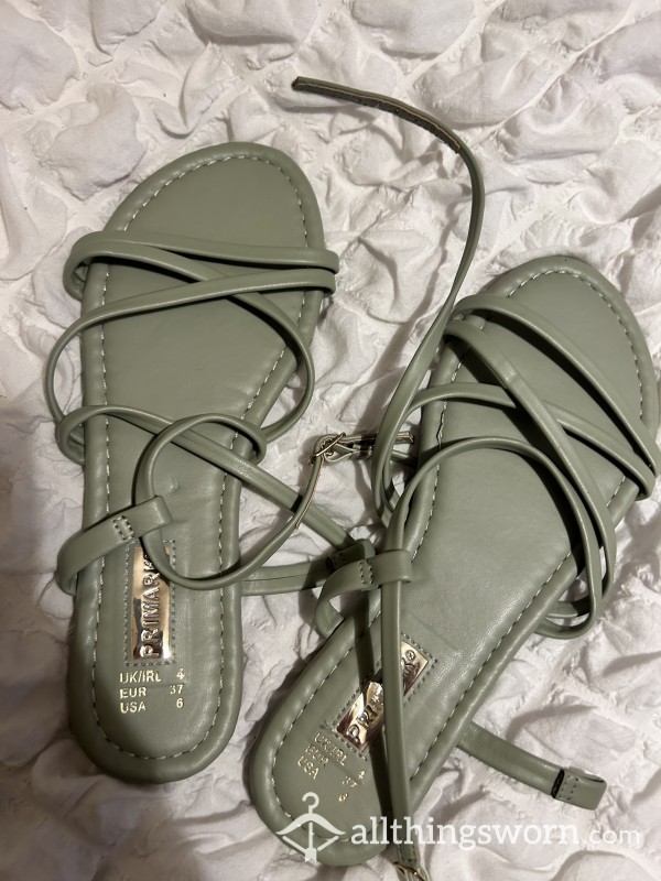 Cute Green Flat Sandals Worn On Holidays