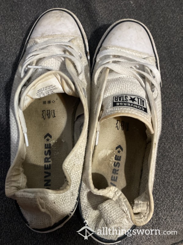 Dirty White Converse That Have Been Worn Frequently Without Socks