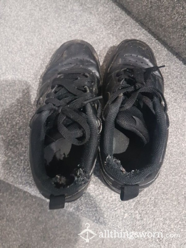 Extremely Well Worn Nike Trainers