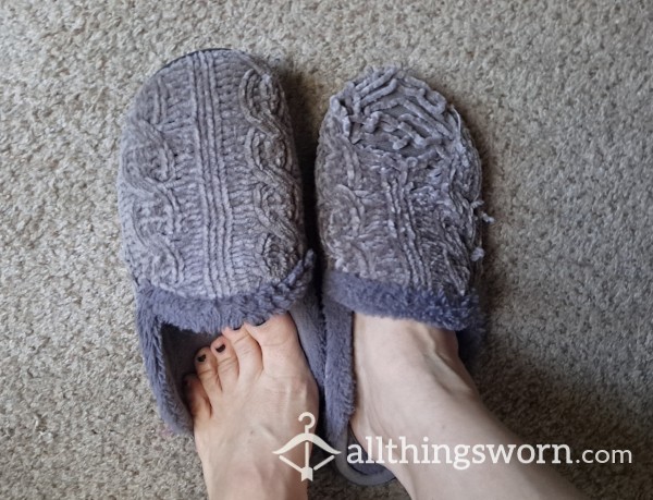 Extremely Worn Gray Slippers Worn With No Socks