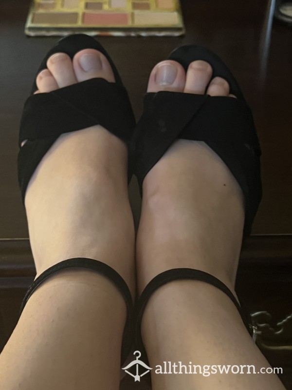 Feet In Black Heels