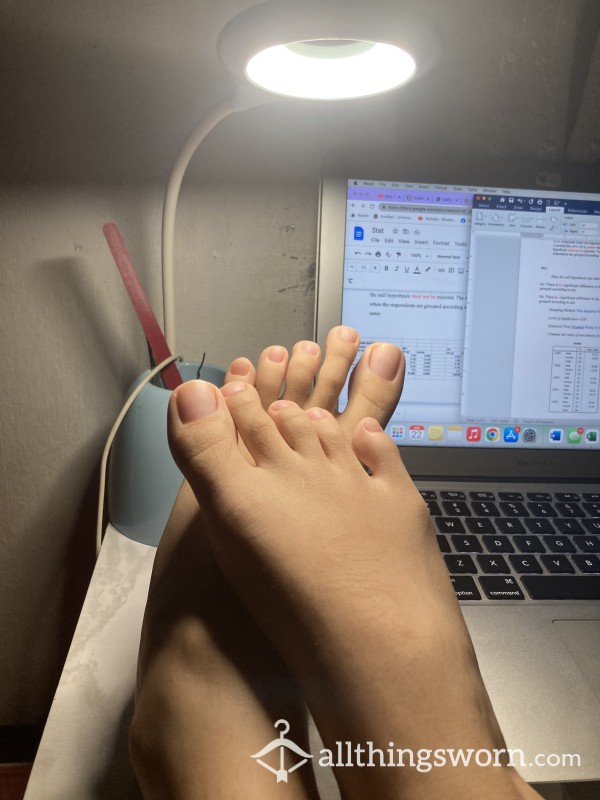 Feet On Desk While Studying