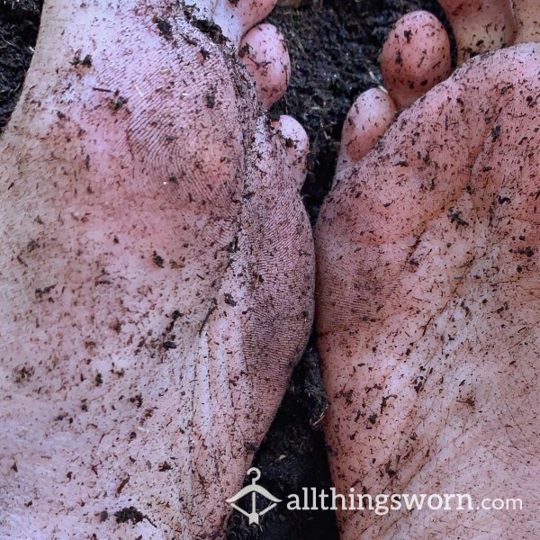 Feet With Wrinkly Soles In Dirt