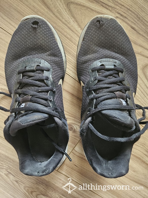 Filthy And Very Worn Nike Trainers