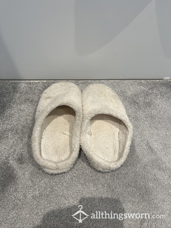 Floppy And Baggy Worn Slippers