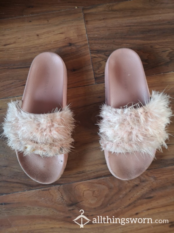 Fluffy Worn Pink Slippers That Have My Feet Shape Inbedded