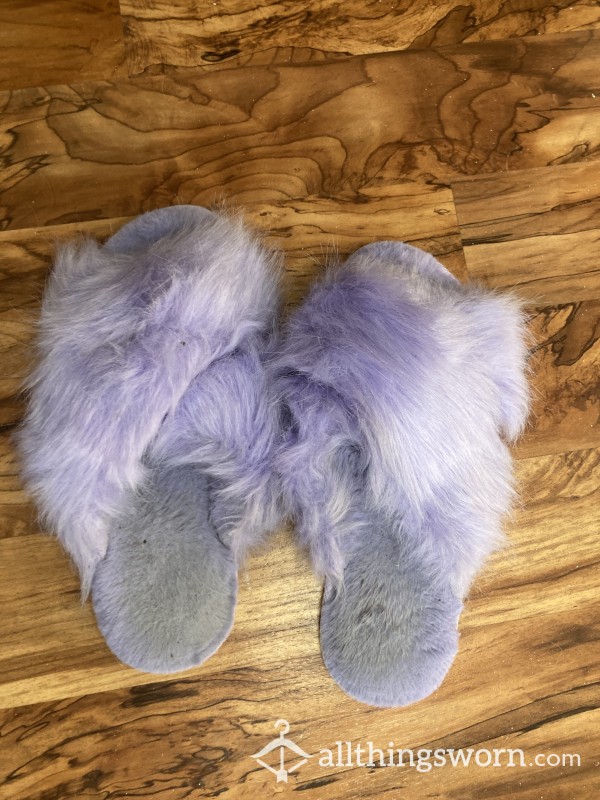 Fuzzy Purple Slippers With Worn-in Foot Prints