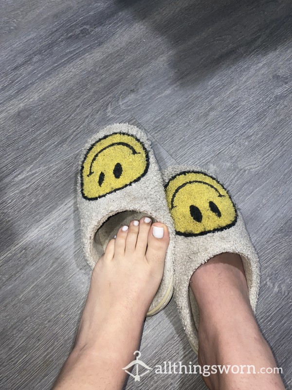 Heavily Used Slippers With Feet Pic