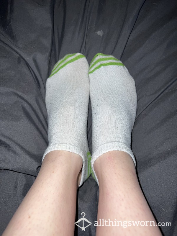 Heavily Worn White And Green Socks