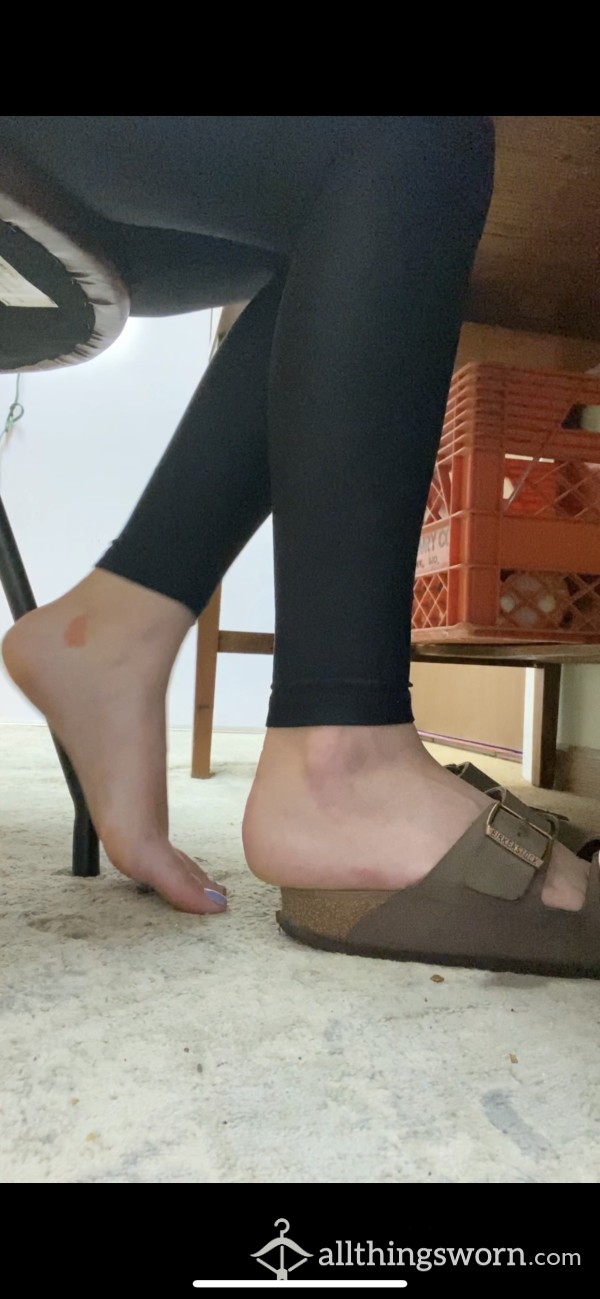 Ignoring Camera While I Show My Feet At Work
