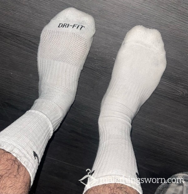 Musky Mismatched White Nike Long Socks.