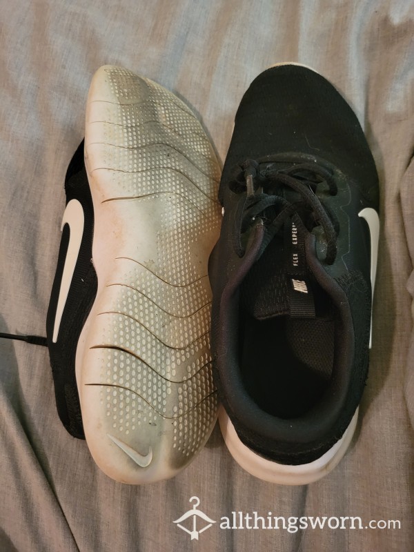 Old And Worn Black Nike Workout Sneakers