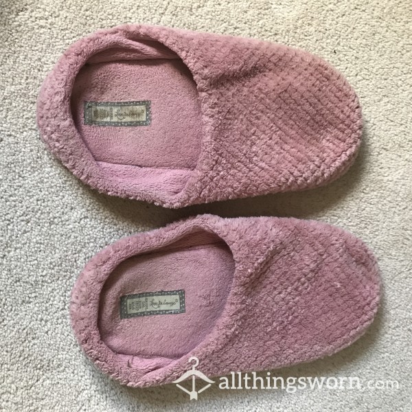 Old Dirty Slippers With Foot Imprint