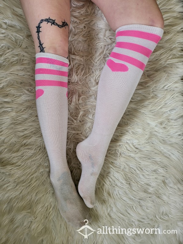 Old, Dirty, White Knee High Socks With Pink Stripes And Hearts