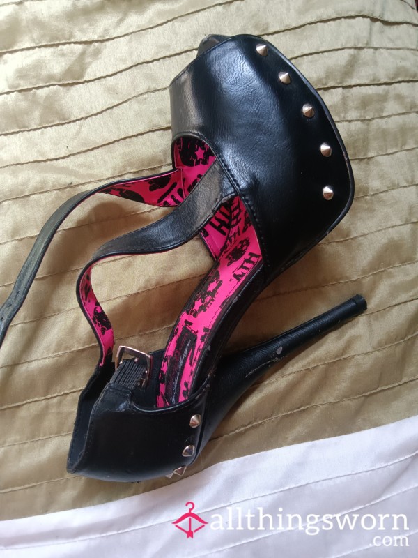 Old Worn And Scuffed Black High Heels