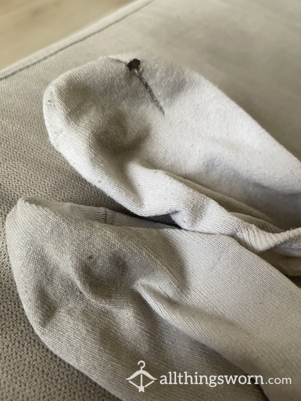Old Worn Sweaty Socks With Holes