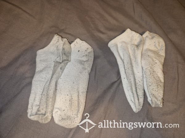 Pair Of White Used Decorating Socks