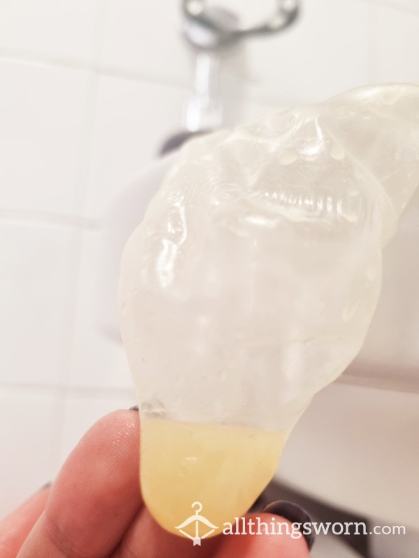 Peeing Into A Cum Filled Condom