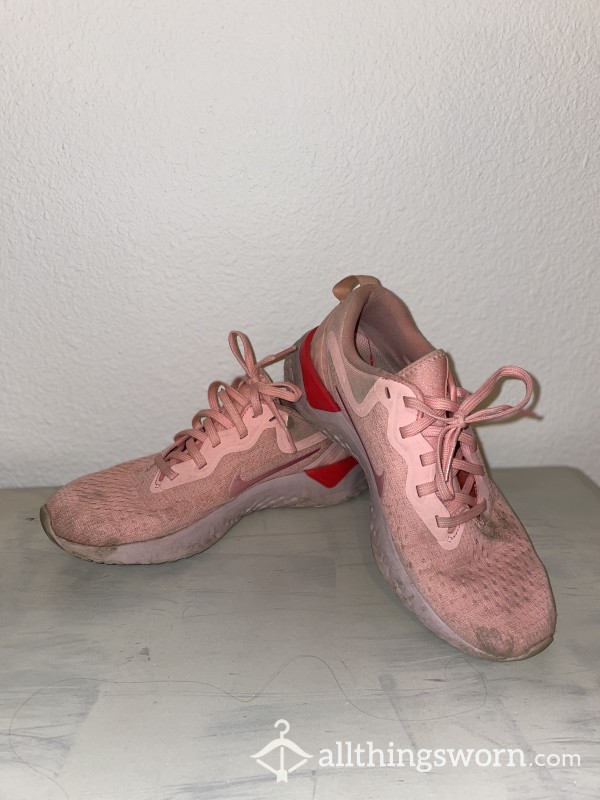 Pink Heavily Worn Nike Tennis Shoe