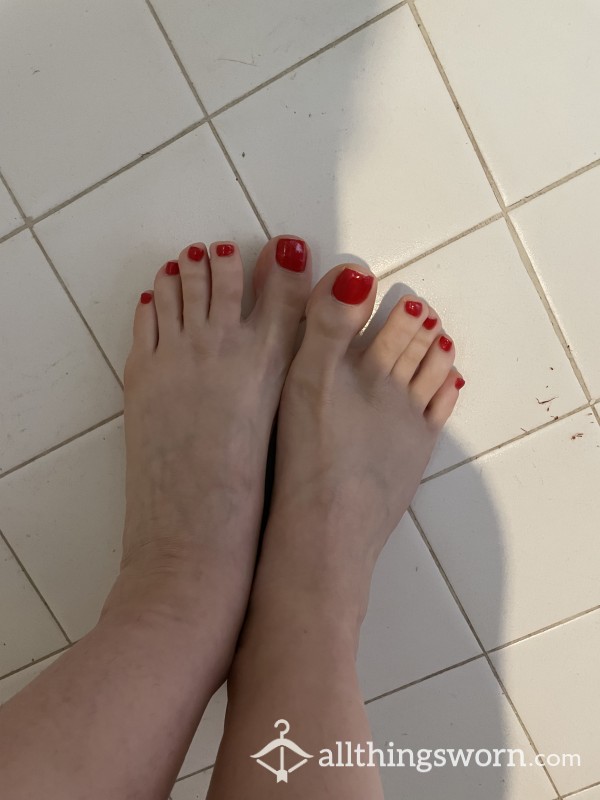 Red Toe Nails In The Bathroom