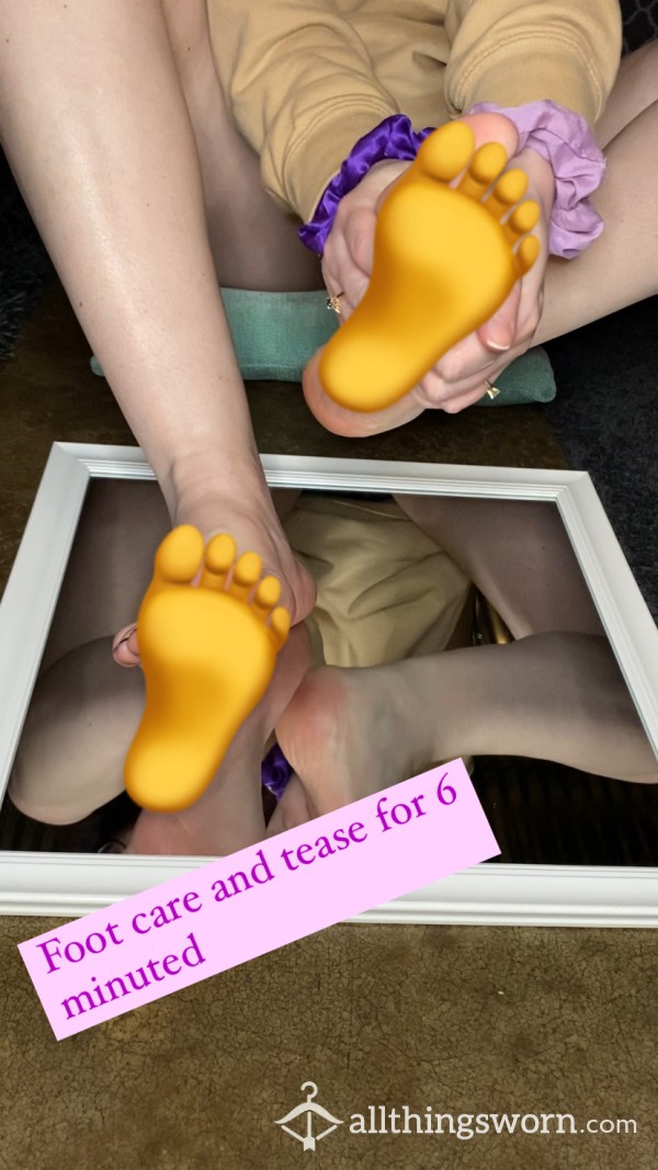 Rubbing Lotion& Oils On My Tired Feet In A Mirror