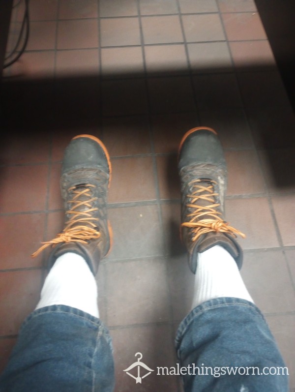Sneaky At Work Taking Boots Off