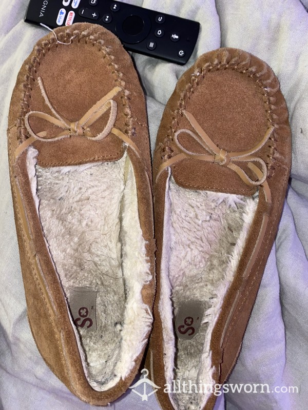 Stained And Heavily Worn Moccasins
