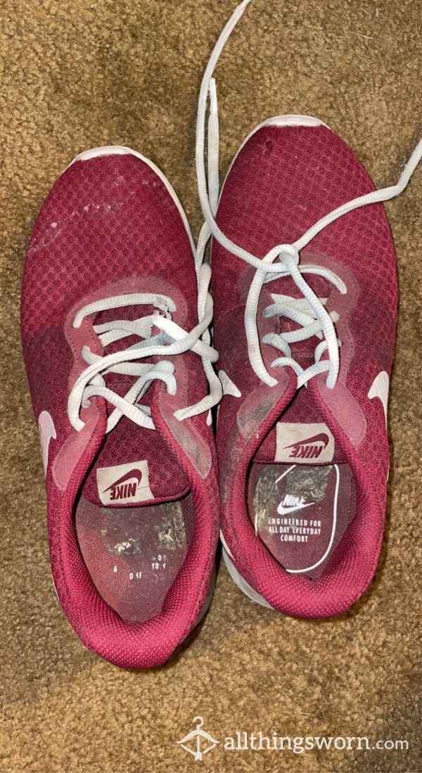 Super Dirty And Used Red Nike Sneakers