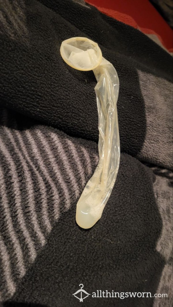 Used And Filled Condom