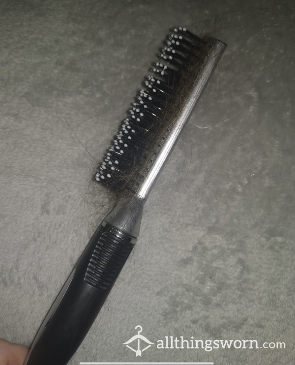 Used Hairbrush Covered With Natural Smelling Brown Hair