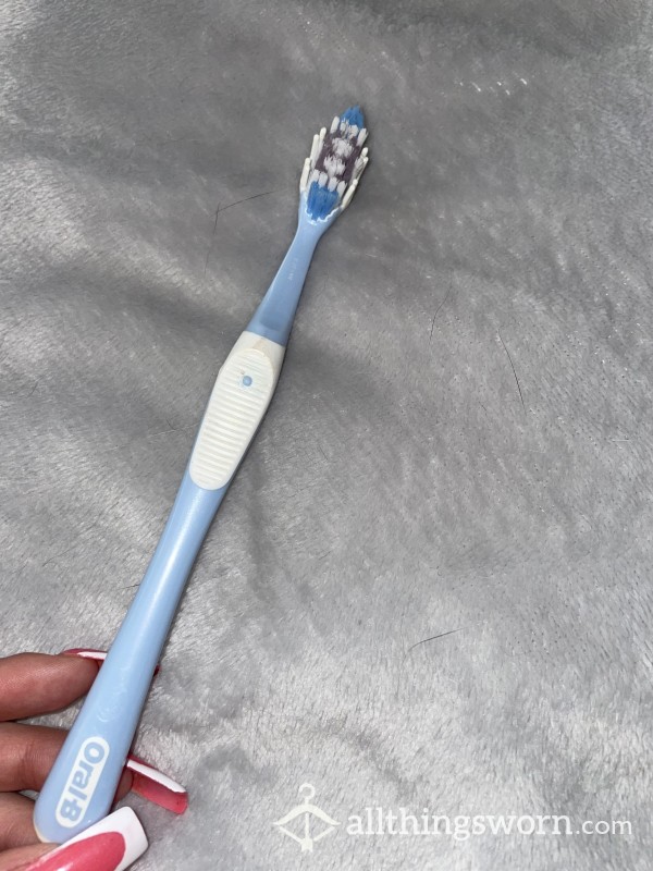 USED TOOTH BRUSH