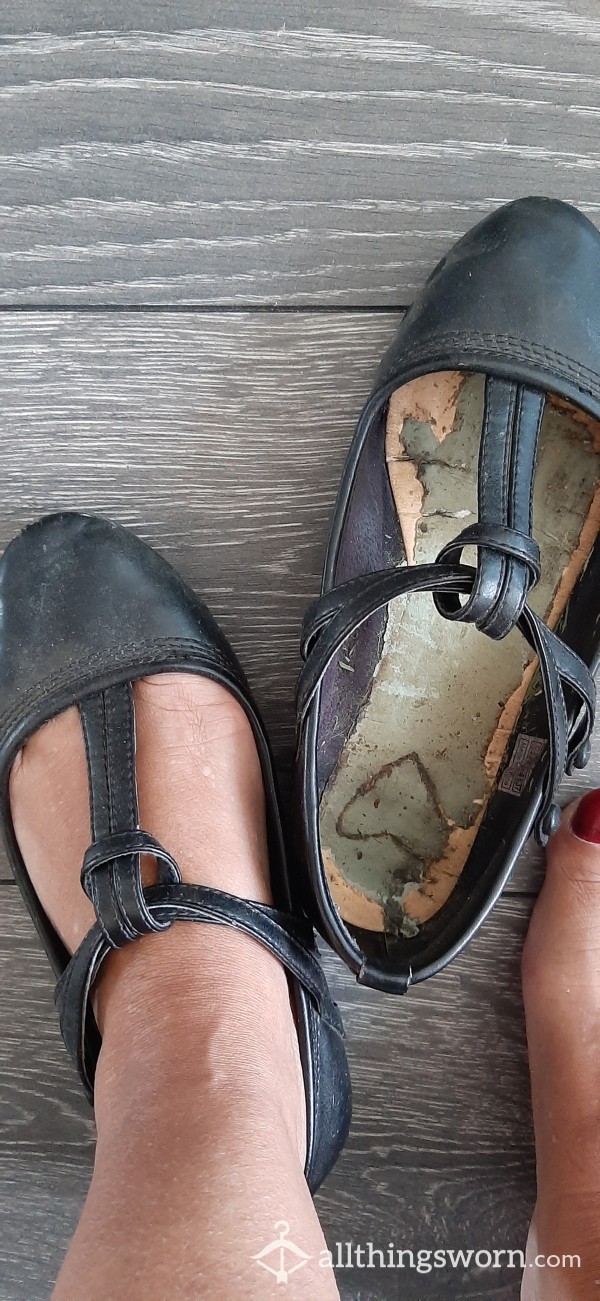Very Old And Well Worn Black Flat Shoes