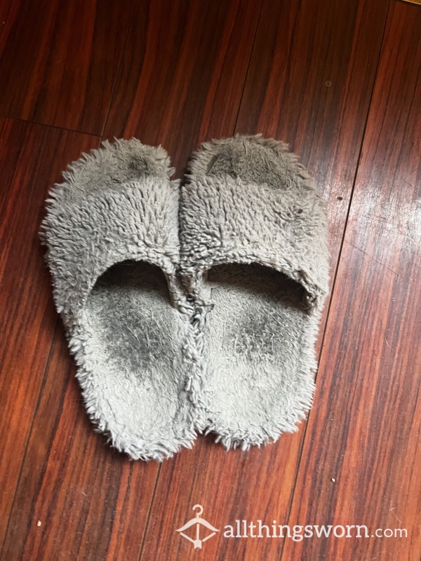 Very Trashed And Worn Out Gray Slippers