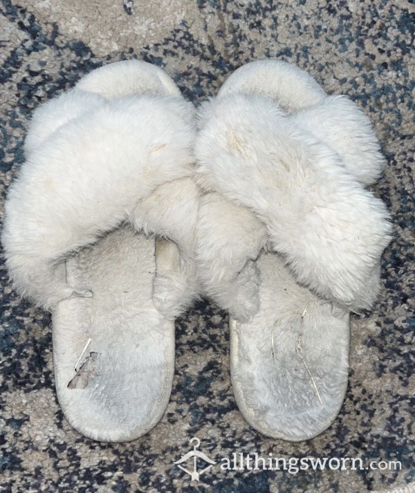 Very Well-Worn White Fuzzy Slippers