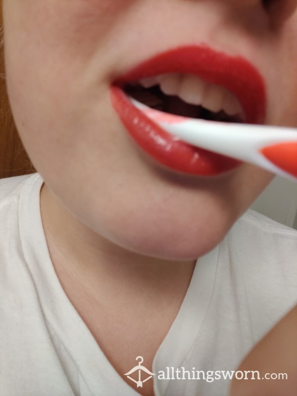 Well Used Toothbrush With Lipstick Marks