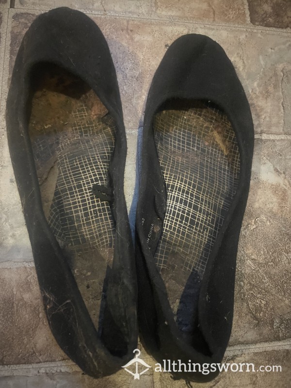 Well Worn And Smelly Black Pumps