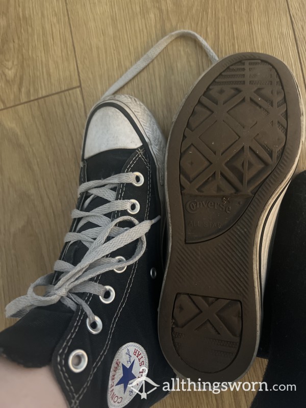 Well-worn Black Converse Hi Tops