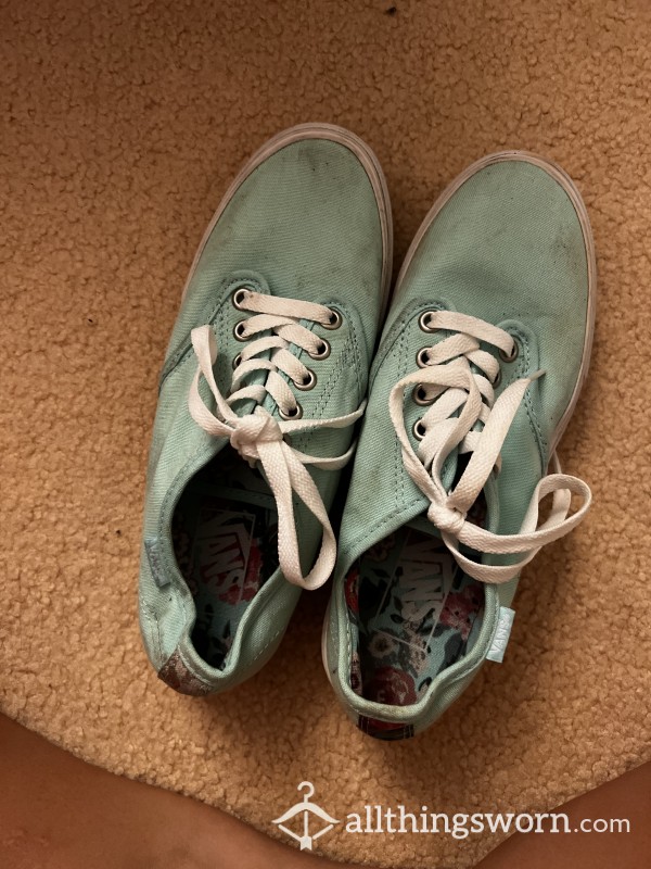 Well-worn Blue Vans Shoes With Worn Socks