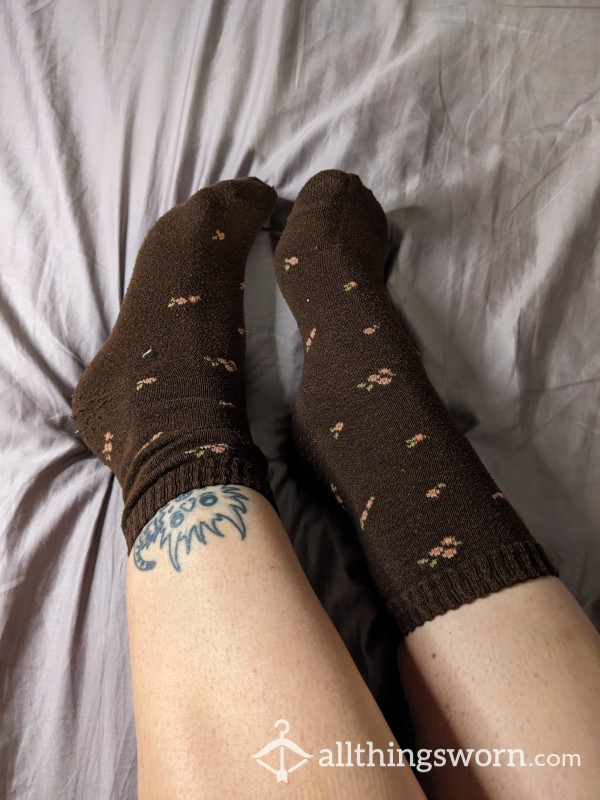 Well Worn Brown Socks With Flowers