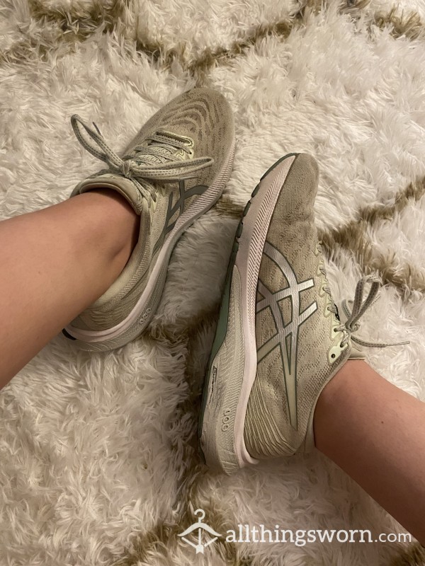 Well-worn College Athlete Asics Running Shoes